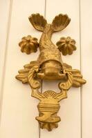 Antique door knocker in Cartagena de Indias photo