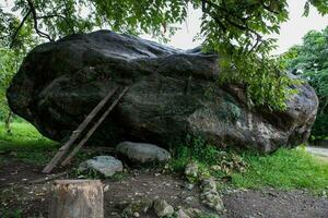 One of the gigantic rocks dragged by the avalanche, caused by the Nevado del Ruiz, that destroyed the city of Armero in 1985 photo