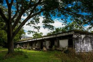Remains of the destroyed San Lorenzo Hospital of the Armero Town buried by the avalanche up to the second floor after 37 years of the tragedy caused by the Nevado del Ruiz Volcano in 1985 photo