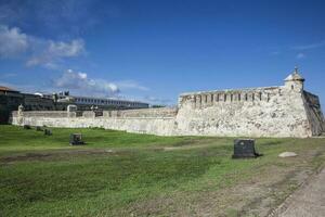 Walls of Cartagena de Indias built at the end of the XVI century for the defense of the city. The breakwater of Santa Catalina usually called The Pincer or El Espigon de la Tenaza. photo