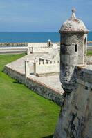 Walls of Cartagena de Indias built at the end of the XVI century for the defense of the city. The breakwater of Santa Catalina usually called The Pincer or El Espigon de la Tenaza. photo