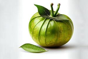 Single fresh green whole and halved tomatillo in a husk isolated on white background. photo