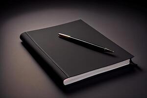 Top view of light desk with empty black notepad, pen and coffee cup. photo