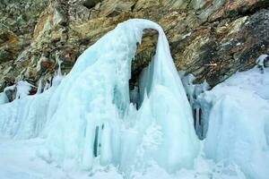 Pieces of frozen ice on baikal. Broken ice. photo