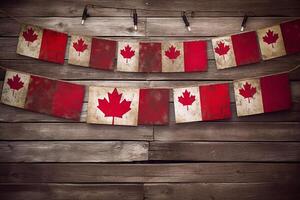 Canada flag on the ropes on wood background., photo