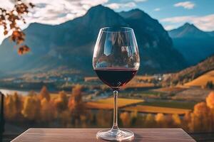 rojo vino vaso y hermosa otoño paisaje montañoso, ai generativo foto