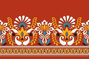 Indian Ikat floral paisley embroidery on red background.Ikat ethnic oriental pattern traditional.Aztec style abstract vector illustration.design for texture,fabric,clothing,wrapping,decoration,sarong.