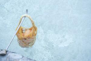 Boiled egg in hot spring at San Kamphaeng Hot Springs in Chiang Mai, Northern Thailand photo