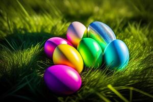 Colorful Easter eggs on green grass with beautiful bokeh background. photo