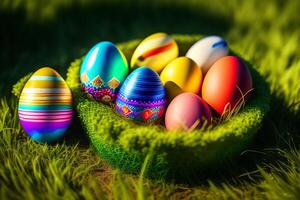 Colorful Easter eggs on green grass with beautiful bokeh background. photo