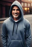 A man in a gray sweatshirt stands on the street smiling at the camera against the background of a building, a portrait of a character. , generative, AI photo