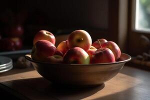 A bowl of apples sitting on a table, photo