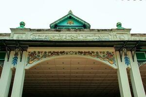 Details of the Yogyakarta Palace gate building during the day photo