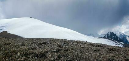 Snow mountain dome. The top of the mountain Dome of three lakes. Altai mountains. Panoramic view. photo