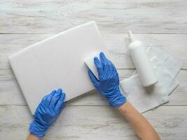 Laptop disinfection to protect yourself from bacteria and viruse photo