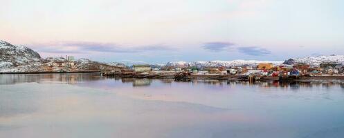 Wide panorama of the Arctic fishing village. Amazing view of winter Teriberka photo