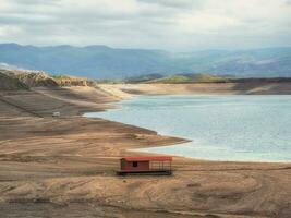 Floating hotel on the beach. Futuristic views of the canyon and reservoir. Chirkeyskoye reservoir is the largest artificial reservoir in the Caucasus. photo