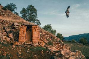 Ancient stone crypt. Abandoned ethnic aul. Ancient ghost town of Gamsutl, Dagestan photo