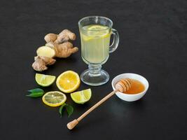 Antiviral drink with lemon, honey and ginger root, strengthening of immunity concept photo