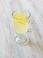 Antiviral drink with lemon, honey and ginger root, strengthening of immunity concept photo