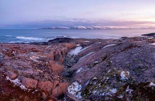 Amazing sunrise landscape with polar white snowy range of mounta photo