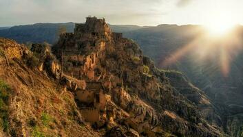 Abandoned ethnic aul. Old abandoned ghost town of Gamsutl, Dagestan, Russia. photo