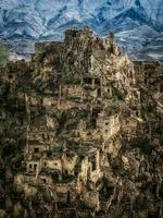 Abandoned ethnic aul. Old abandoned ghost town of Gamsutl, Dagestan, Russia. photo