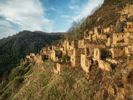 Abandoned ethnic aul. Old abandoned ghost town of Gamsutl, Dagestan, Russia. photo