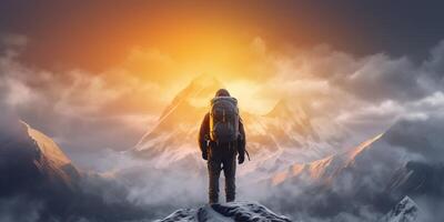 The closeup view of a man with backpack who stand in front of high mountain with . photo