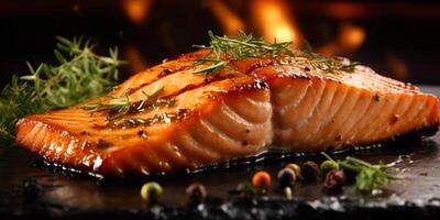 The close up view of grilled salmon fillet with . photo