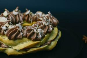 Cake with chocolate biscuit and vanilla cream photo