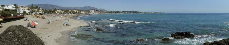 2023.04.08 - Spain, Andalusia, Cala de Mijas - Panoramic View of Sea Shore and Beach photo