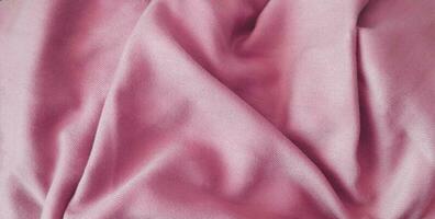 rosado tela fondo, seda tela, satín textil textura, resumen fondo, lujo antecedentes foto