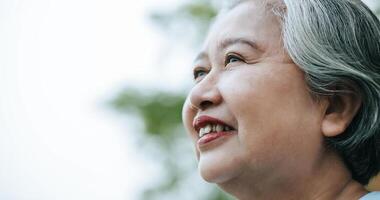 portrait of adult asian woman smiling with happiness photo