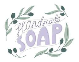 Handmade soap handwritten text lettering. Olive branches with berries and leaves. Vector isolated label or sticker in flat style.