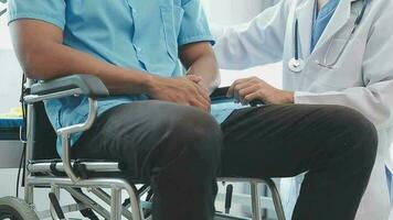 Physiotherapist working with patient in clinic, closeup video