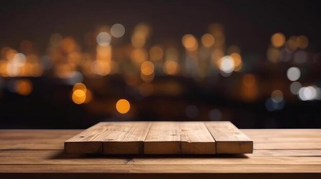 Empty wooden table platform and bokeh of the city at night. photo
