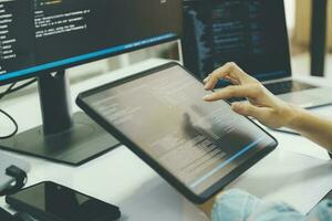 Close up programmer is coding and programming software. photo