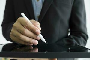 Business man sign a contract investment professional document agreement. photo