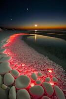 beach is lit up with red lights. . photo