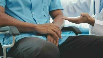 Physiotherapist working with patient in clinic, closeup video