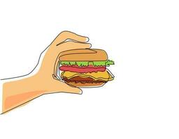 Single continuous line drawing hand holding burger. Hamburger. Delicious fast food. Cutlet with vegetables in bun with sesame seeds. Hand holding hamburger. Dynamic one line draw graphic design vector