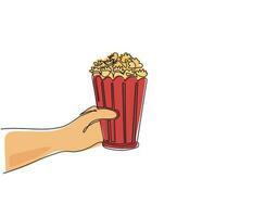 Single one line drawing hand holding popcorn. Human hands holding popcorn box. I love movie cinema icon. Watching movie concept in flat design style. Modern continuous line draw design graphic vector