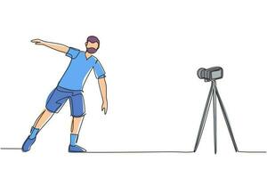 Continuous one line drawing happy young Arab man doing exercise on mat with camera. Shooting video for blog on video camera. Online training. Sport at home. Single line draw design vector illustration