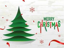 Red and green text Merry Christmas and paper cut xmas tree on white wooden background for celebration concept. vector