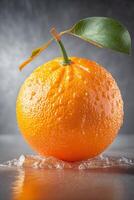 there is a orange with leaf on it sitting table. . photo