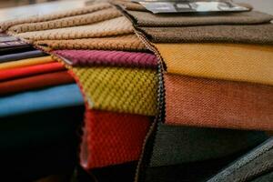 Colorful samples of upholstery fabrics for upholstered furniture. photo