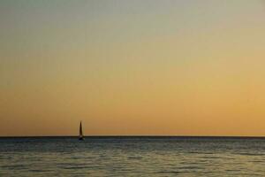 Sailing Yacht In The Sea At Sunset. Black Sea. photo