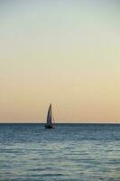Sailing Yacht In The Sea At Sunset. Black Sea. photo