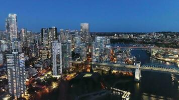 Aerial view on downtown of Vancouver at night, Granville bridge and False Creek video